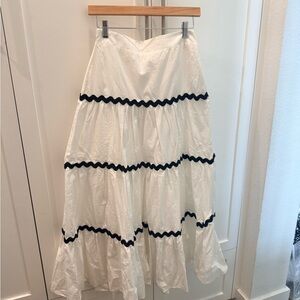 Olivaceous White A-Line Skirt with Black Trim